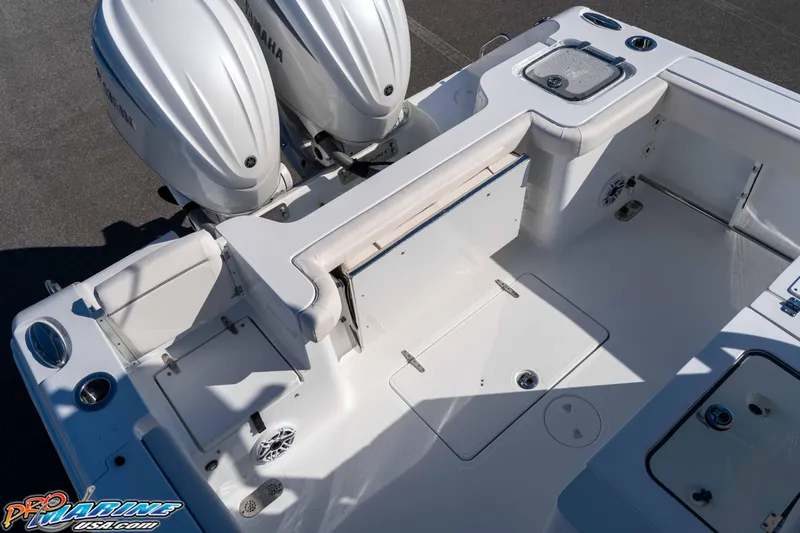 Slide: The Image of 2026 Sea Hunt Gamefish 28 Coffin Box boat deck with Yamaha engines. - 48