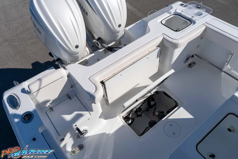 Slide: The Image of 2026 Sea Hunt Gamefish 28 Coffin Box boat with dual Yamaha engines, top view. - 50