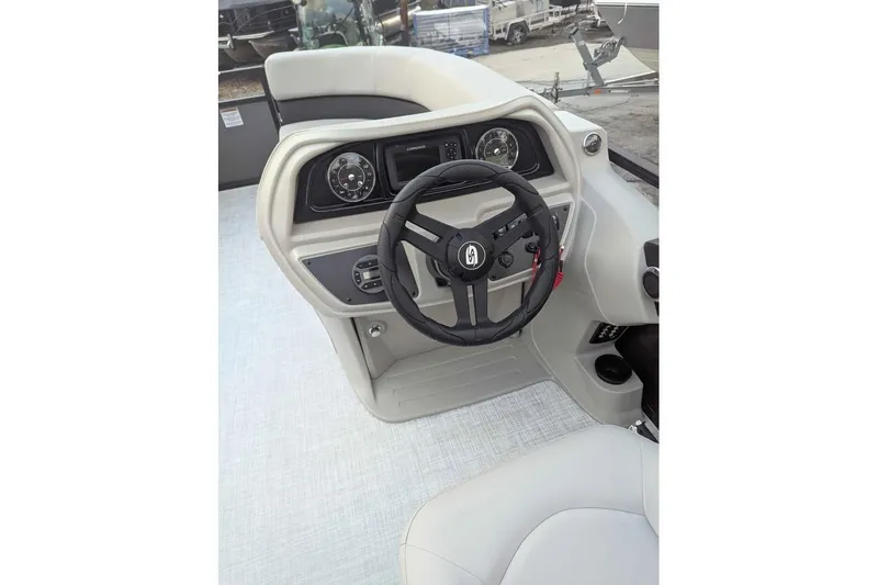 Slide: The Image of Steering console of 2026 Dockside 22DQ boat with modern controls and dashboard. - 11