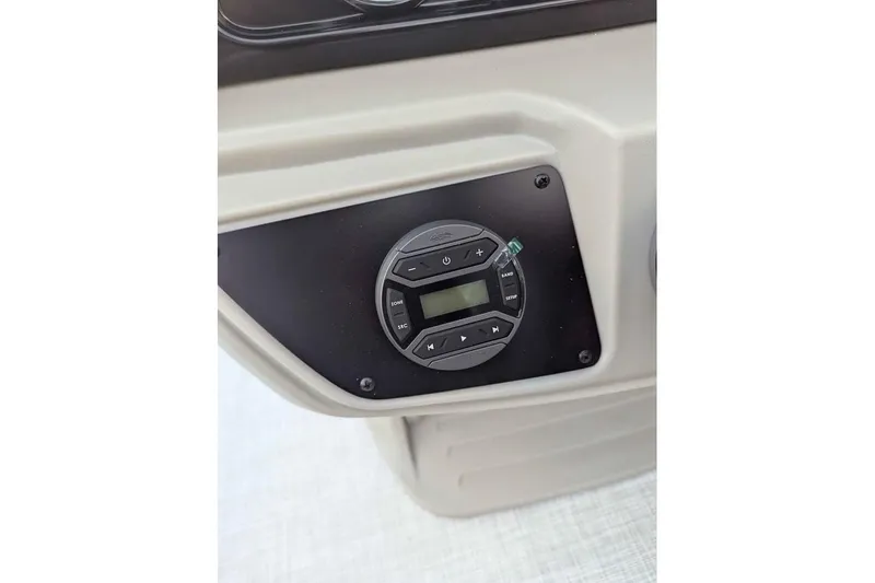 Slide: The Image of Control panel of Dockside 22DQ boat, 2026 model, featuring digital display and buttons. - 14