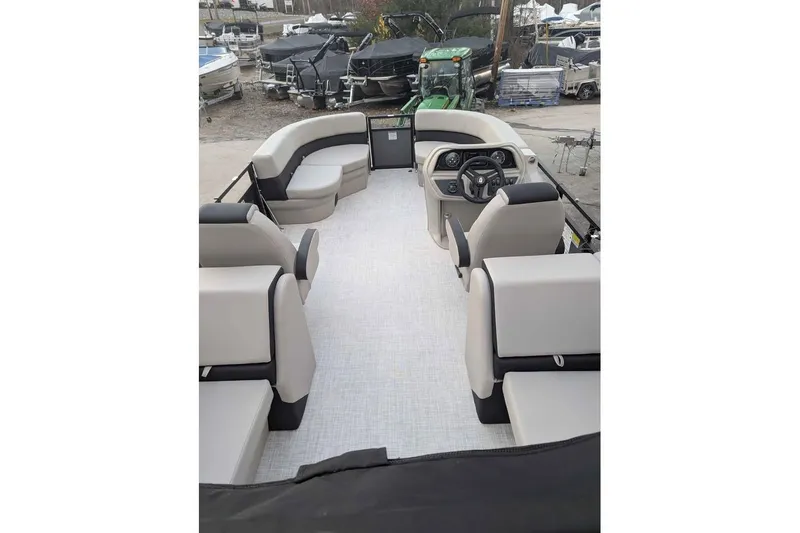 Slide: The Image of 2026 Dockside 22DQ pontoon boat interior with spacious seating and modern helm. - 8