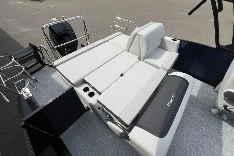 Slide: The Image of 2026 Harris Cruiser 210 boat with spacious seating and modern design. - 14