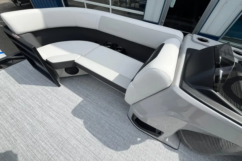 Slide: The Image of 2026 Harris Cruiser 210 boat interior with sleek seating and modern design. - 20