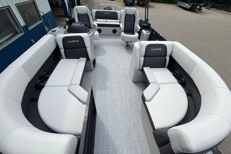 Slide: The Image of 2026 Harris Cruiser 210 pontoon boat interior with luxurious seating and modern design. - 8