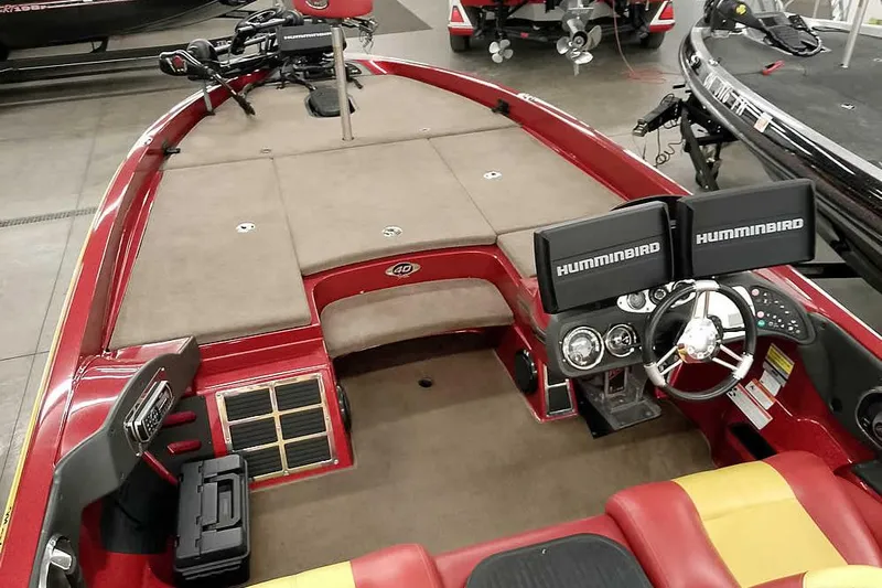 Slide: The Image of 2008 Ranger Z520 Comanche boat interior with dual Humminbird displays and steering wheel. - 18