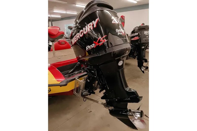 Slide: The Image of 2008 Ranger Z520 Comanche with Mercury Pro XS outboard motor in a showroom. - 2