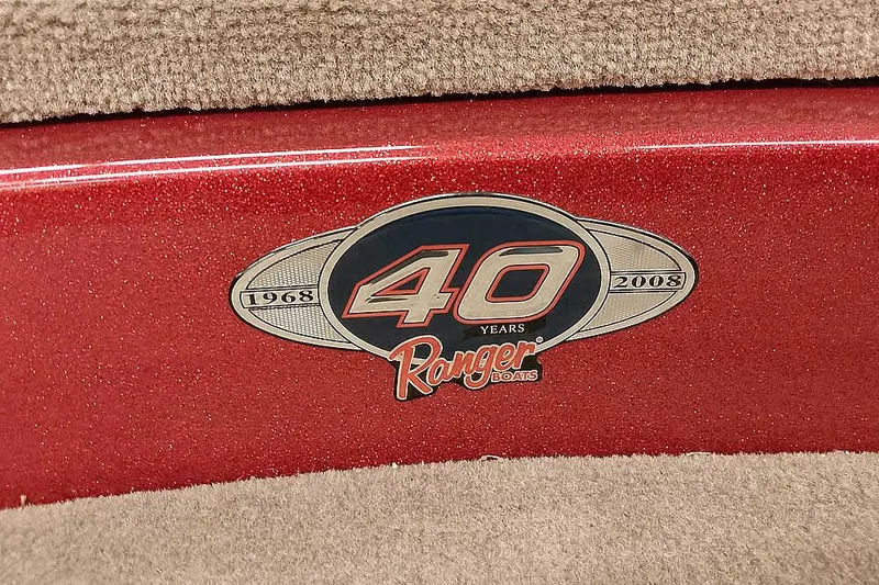 Slide: The Image of 2008 Ranger Z520 Comanche 40th anniversary logo on red surface. - 20