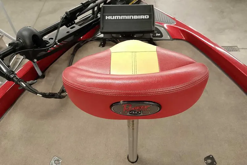 Slide: The Image of 2008 Ranger Z520 Comanche boat seat with Humminbird fish finder, red and yellow design. - 26