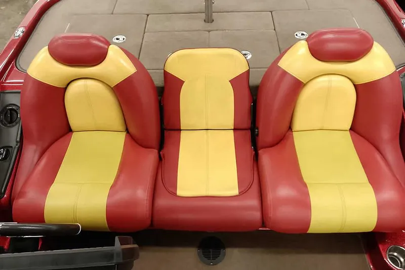 Slide: The Image of Red and yellow seats in a 2008 Ranger Z520 Comanche boat. - 32