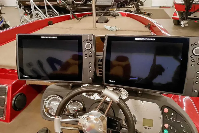 Slide: The Image of 2008 Ranger Z520 Comanche boat dashboard with dual Humminbird Helix 12 fish finders. - 39