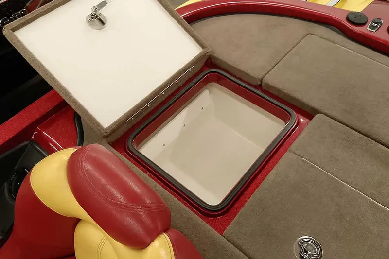 Slide: The Image of 2008 Ranger Z520 Comanche boat storage compartment with red and yellow seating. - 42