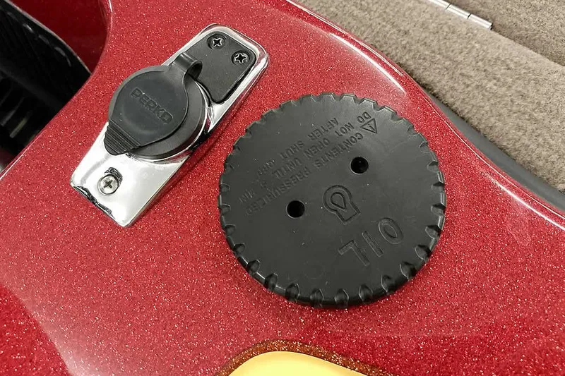 Slide: The Image of Red Ranger Z520 Comanche 2008 boat detail with Perko cap and oil cover. - 46