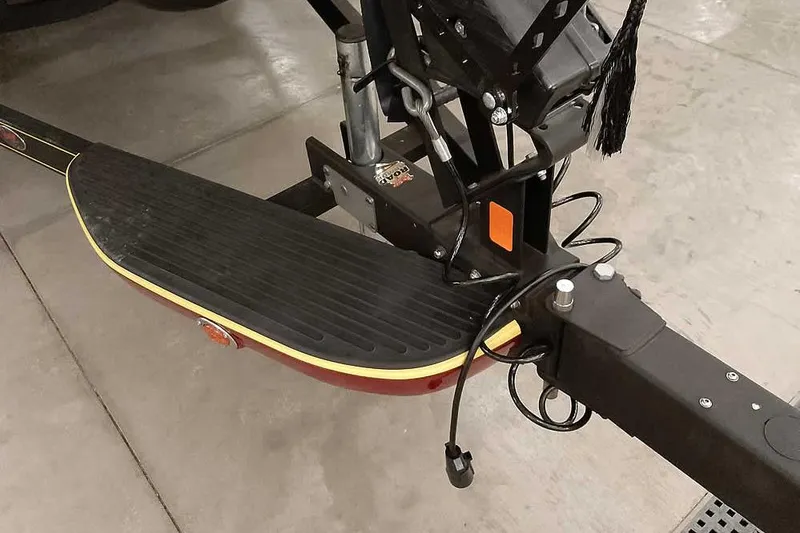 Slide: The Image of 2008 Ranger Z520 Comanche boat trailer hitch with step, parked indoors. - 5