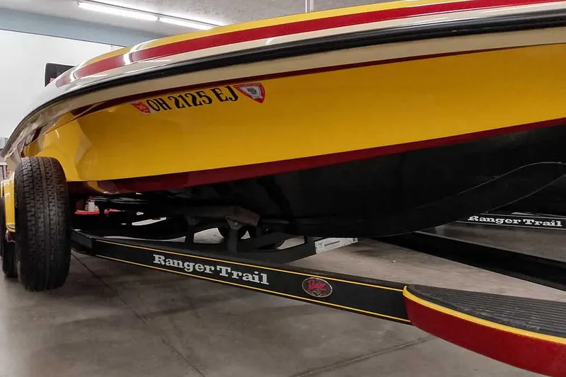 Slide: The Image of 2008 Ranger Z520 Comanche boat on Ranger Trail trailer in garage. - 6