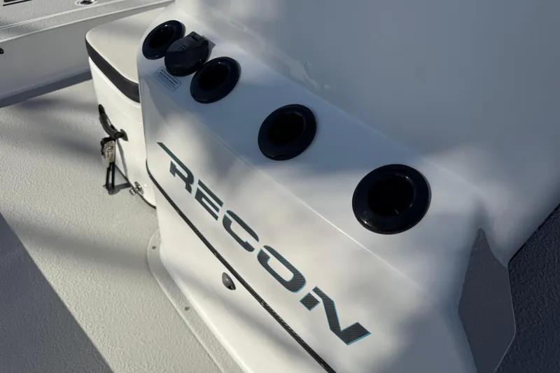 Slide: The Image of 2018 SCB Recon boat console with rod holders and logo. - 20