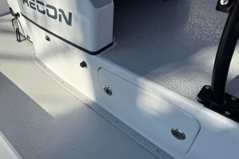Slide: The Image of 2018 SCB Recon boat deck with storage compartment and textured flooring. - 29