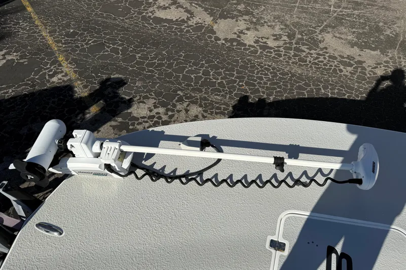 Slide: The Image of 2018 SCB Recon boat deck with mounted trolling motor, shadowed pavement background. - 46
