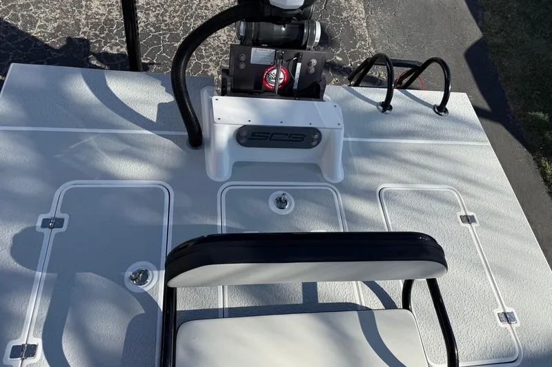 Slide: The Image of 2018 SCB Recon boat deck with seating and storage compartments. - 7