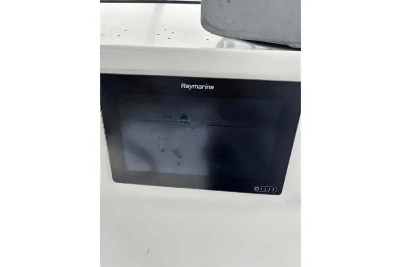 Slide: The Image of Raymarine display on 2006 Sea Hunt Triton 207 boat dashboard. - 23