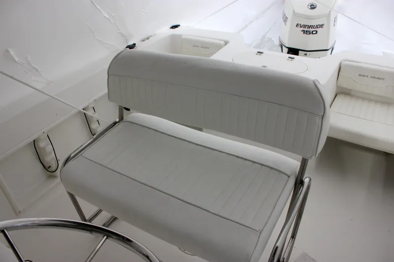 Slide: The Image of Interior of 2006 Sea Hunt Triton 207 boat with Evinrude 150 engine. - 3