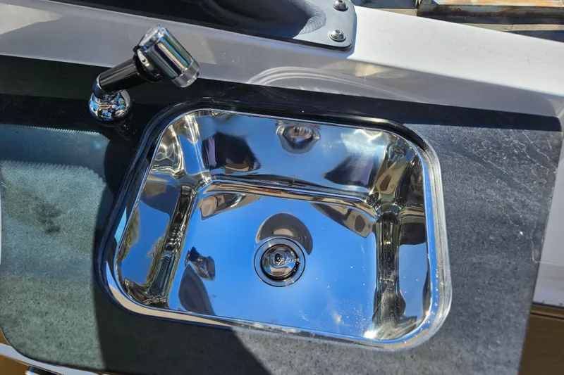 Slide: The Image of Stainless steel sink on 2026 Monterey Elite 27 OB boat. - 14