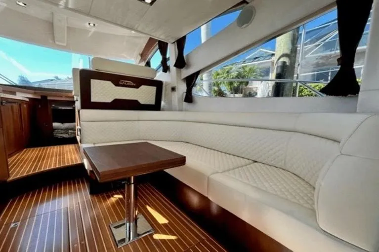 Slide: The Image of Luxurious interior of 2017 Galeon 380 Fly yacht with elegant seating and wooden flooring. - 11