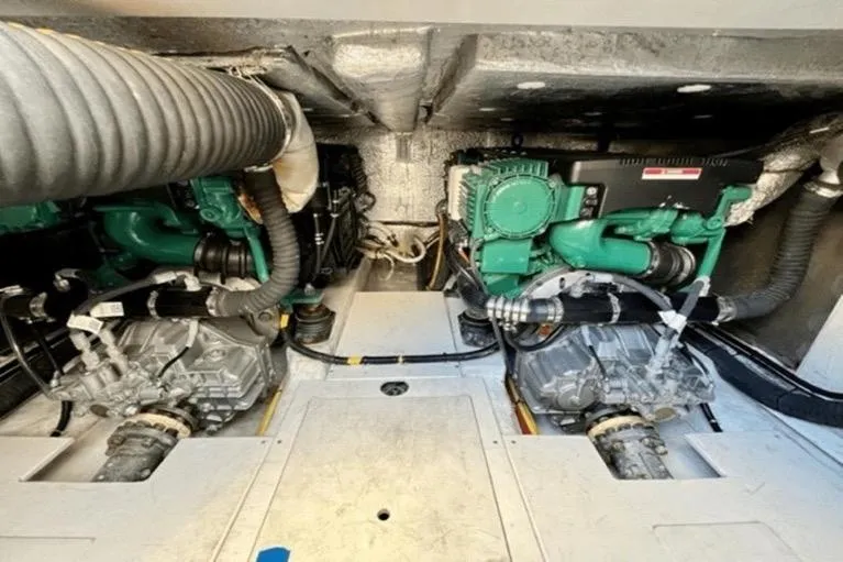 Slide: The Image of Engine room of 2017 Galeon 380 Fly yacht with dual engines and mechanical components. - 19