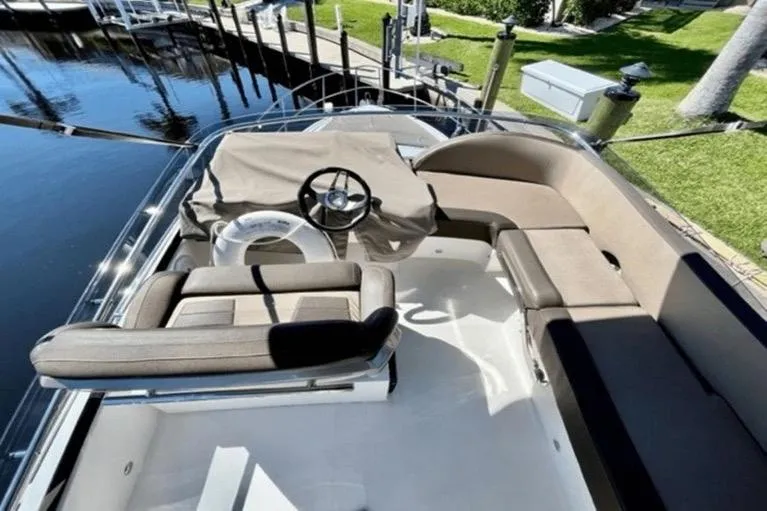 Slide: The Image of Flybridge view of 2017 Galeon 380 Fly yacht with seating and steering wheel. - 4