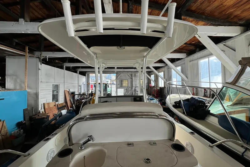 Slide: The Image of 2014 Boston Whaler 270 Dauntless boat in storage, showcasing interior and structure. - 5