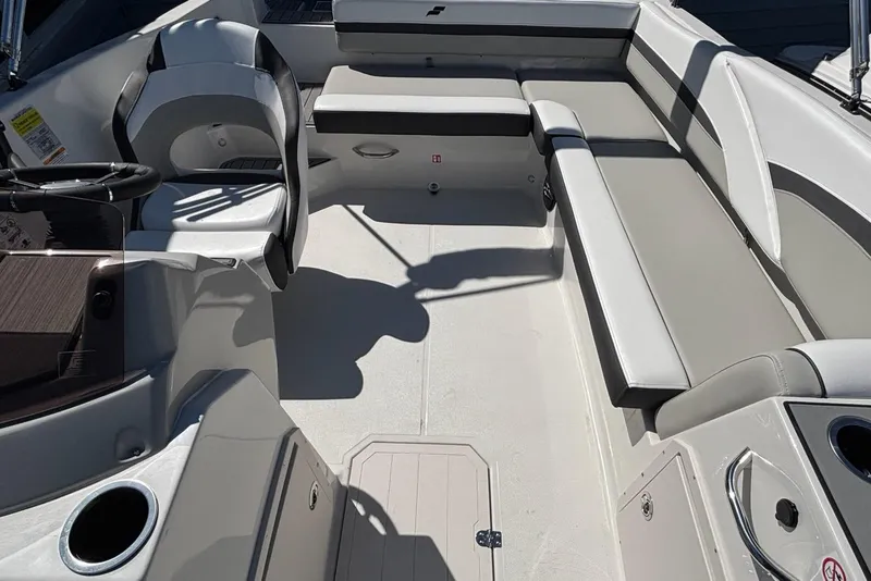 Slide: The Image of Interior of 2026 Starcraft SVX 191 OB boat with seating and steering wheel. - 15