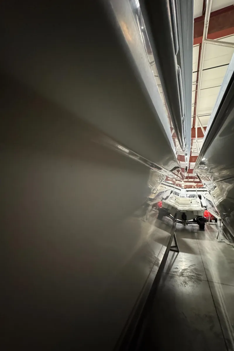 Slide: The Image of 2000 Sea Ray 460 Sundancer yacht in storage, viewed from a narrow angle. - 13