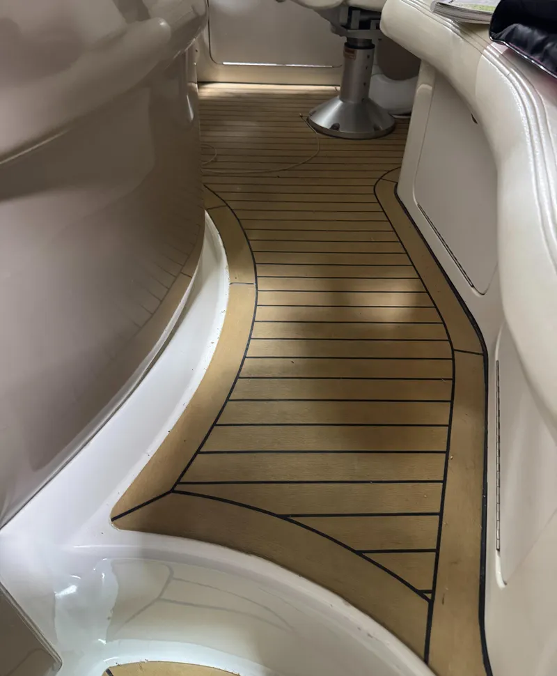 Slide: The Image of Interior view of 2000 Sea Ray 460 Sundancer with sleek wooden flooring. - 17
