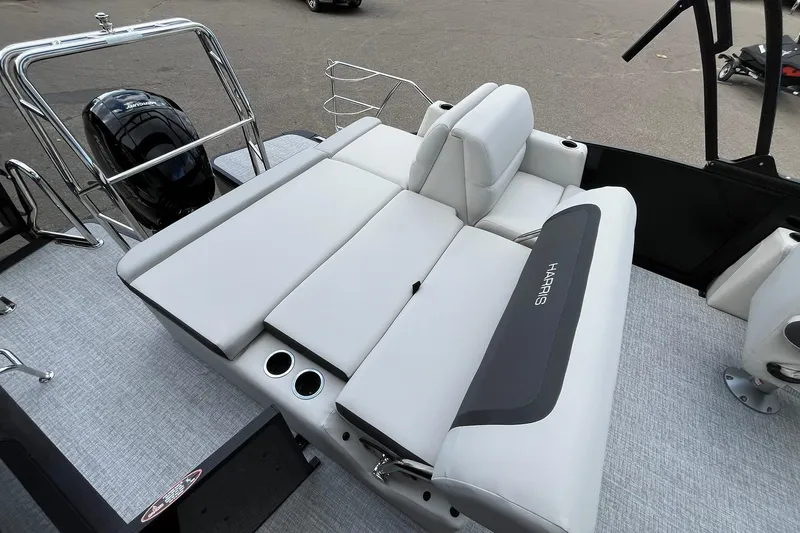 Slide: The Image of 2026 Harris Cruiser 230 boat interior with plush seating and modern design. - 14