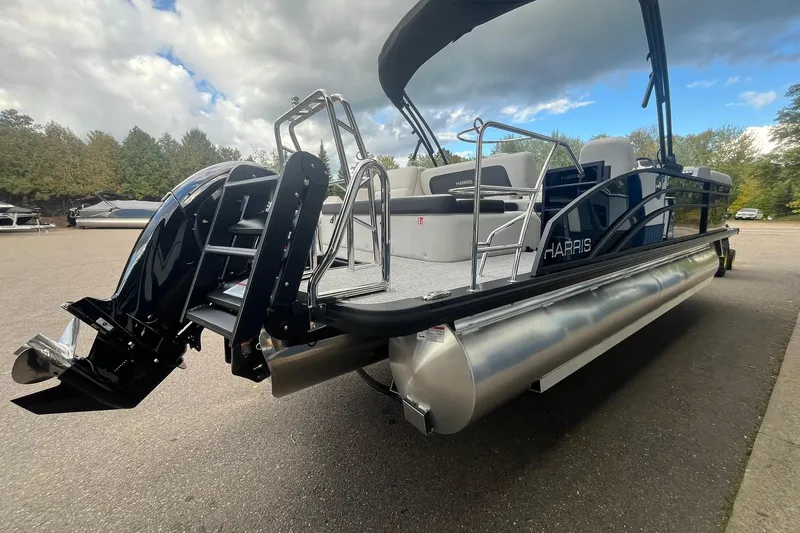Slide: The Image of 2026 Harris Cruiser 230 pontoon boat with sleek design and modern features. - 28