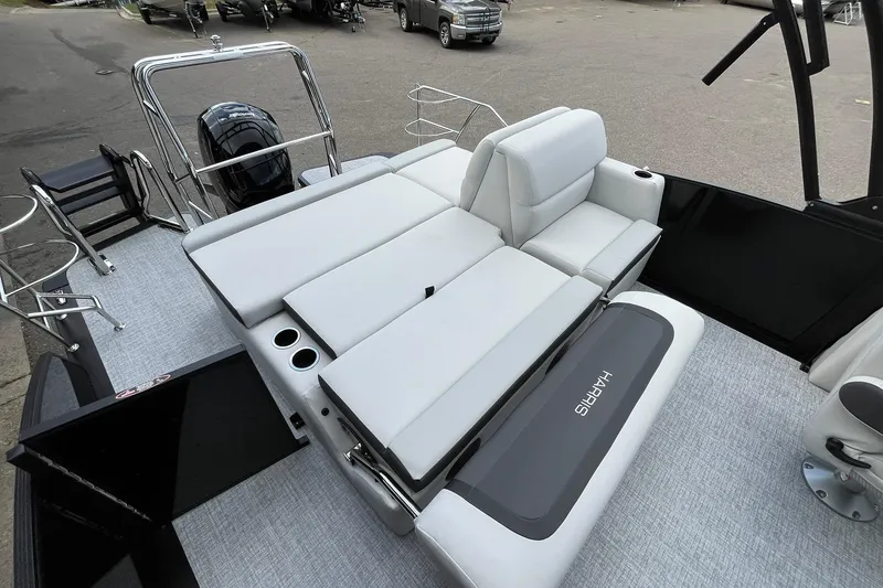 Slide: The Image of 2026 Harris Cruiser 230 boat interior with plush seating and modern design. - 39