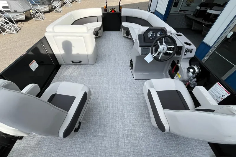 Slide: The Image of 2026 Harris Cruiser 230 interior with modern seating and steering console. - 43