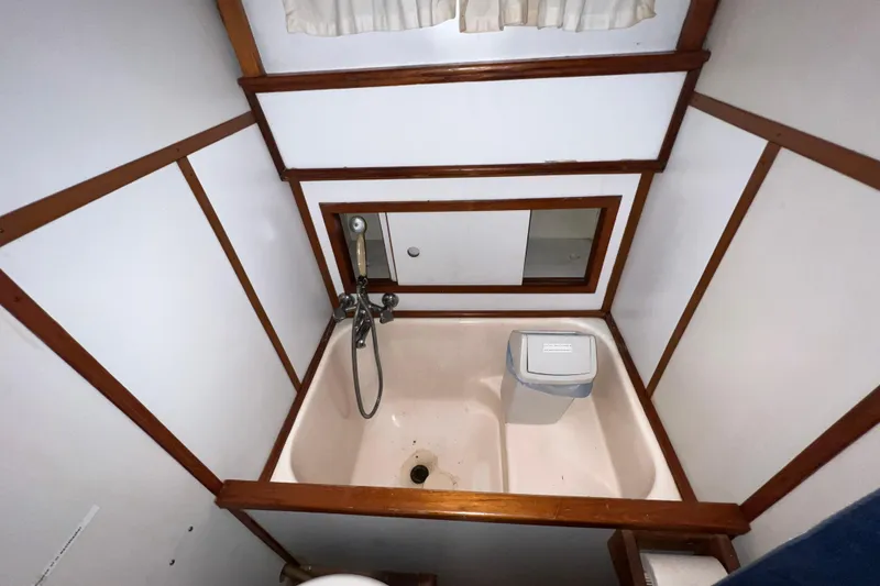 Slide: The Image of Electrical and plumbing systems inside a 1979 Litton Trawler boat. - 17