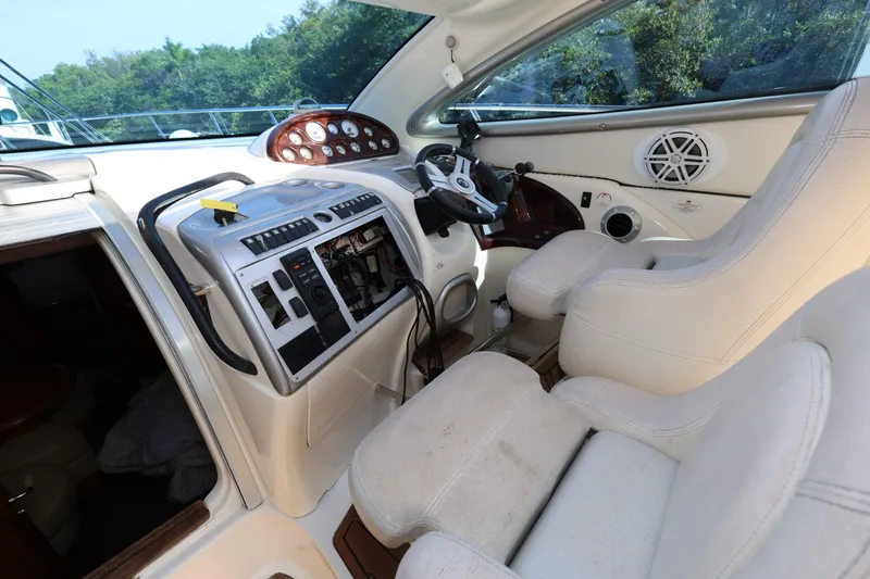Slide: The Image of Interior cockpit of 2007 Cranchi Mediterranee 50 HT yacht with steering wheel and controls. - 12