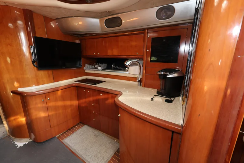 Slide: The Image of Luxurious kitchen interior of 2007 Cranchi Mediterranee 50 HT yacht with modern amenities. - 19