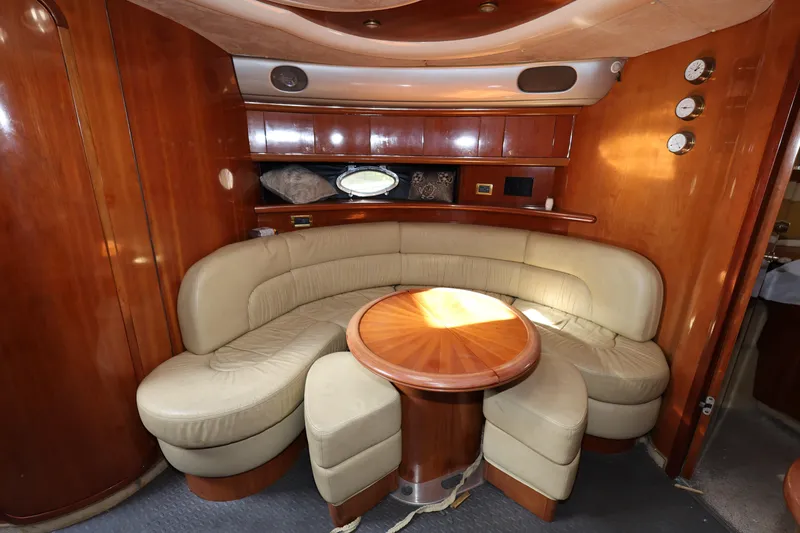 Slide: The Image of Luxurious interior of 2007 Cranchi Mediterranee 50 HT yacht with leather seating and wooden table. - 20