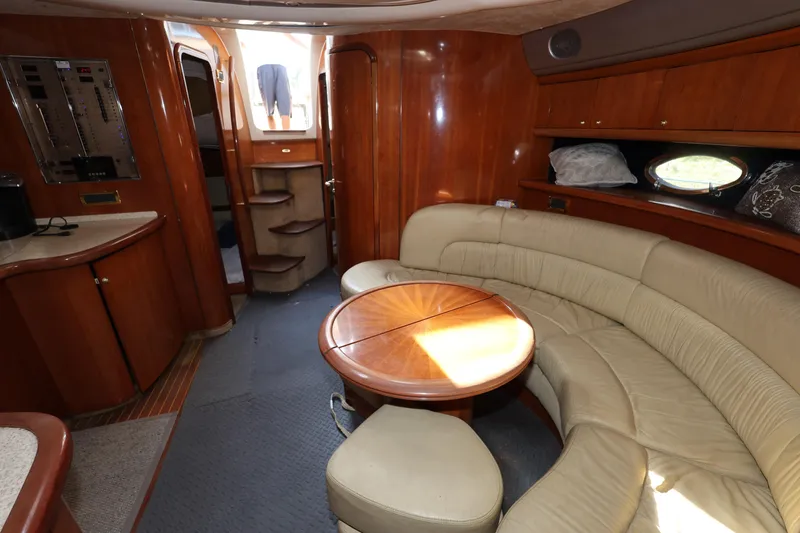 Slide: The Image of Luxurious interior of 2007 Cranchi Mediterranee 50 HT yacht with leather seating and wooden finishes. - 21