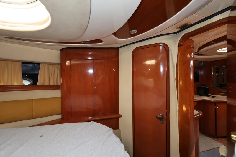 Slide: The Image of Luxurious 2007 Cranchi Mediterranee 50 HT yacht interior with wood finishes and cozy cabin. - 23