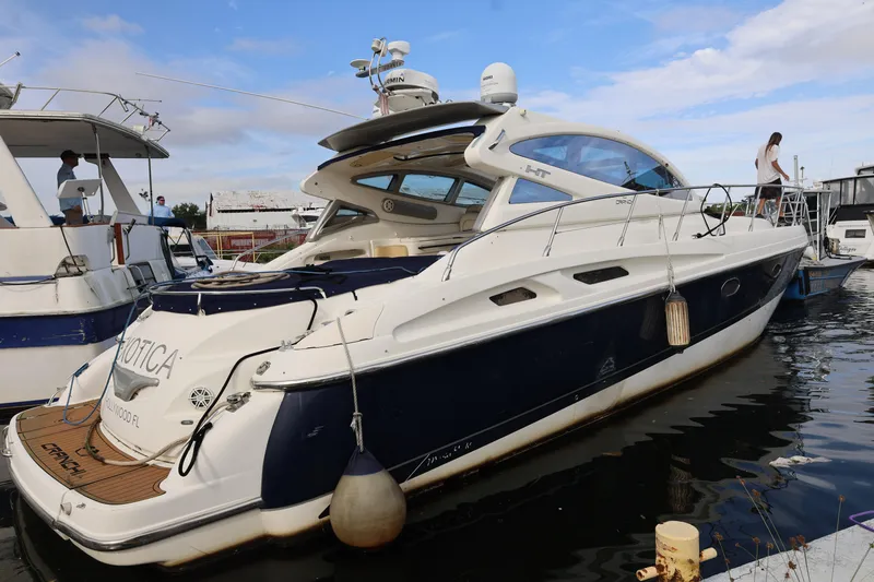 Slide: The Image of 2007 Cranchi Mediterranee 50 HT yacht docked at marina, side view. - 4