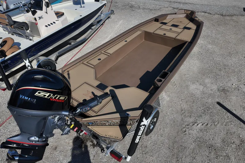 Slide: The Image of 2026 Xpress X18DB boat with Yamaha SHO VMAX engine on trailer. - 4