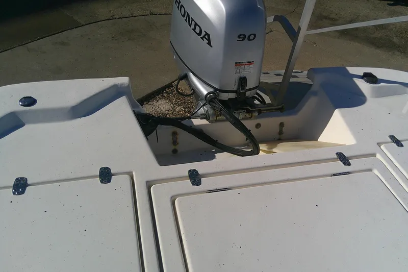 Slide: The Image of 2017 Outcast 19V boat with Honda 90 outboard motor, rear deck view. - 3