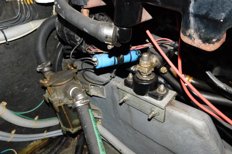 Slide: The Image of Engine compartment of 1986 Sea Ray 390 Express Cruiser with hoses and wiring. - 35