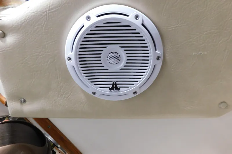 Slide: The Image of White speaker installed on 1986 Sea Ray 390 Express Cruiser interior panel. - 9