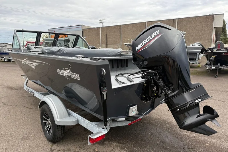 Slide: The Image of 2026 Fish Rite Sportsman 20 boat with Mercury outboard motor on trailer. - 10