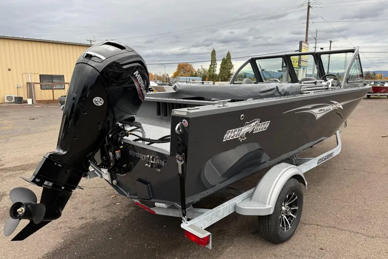 Slide: The Image of 2026 Fish Rite Sportsman 20 boat with Mercury outboard motor on a trailer. - 9