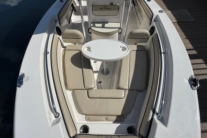Slide: The Image of Interior view of 2022 Sea Chaser 22 HFC boat with seating area. - 16